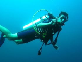 Scuba diver near Pedasi, showing peace sign – Best Places In The World To Retire – International Living